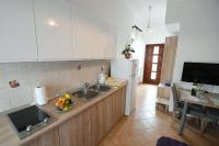 Kuchyň nebo kuchyňský kout v ubytování Studio apartman Kris