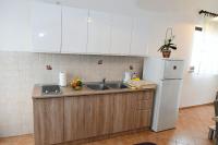 Kuchyň nebo kuchyňský kout v ubytování Studio apartman Kris