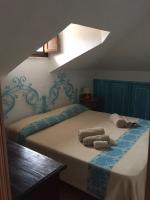 Posteľ alebo postele v izbe v ubytovaní Casa Gallo