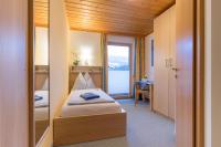 Posteľ alebo postele v izbe v ubytovaní Naturpension Mühlhof