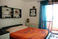 Postel nebo postele na pokoji v ubytování Guest House More