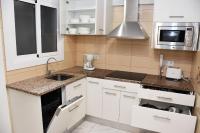 A kitchen or kitchenette at Rosesapparts Mairó