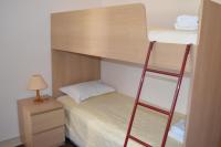 Postel nebo postele na pokoji v ubytování Chrissa Camping Rooms & Bungalows