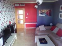 Televízia a/alebo spoločenská miestnosť v ubytovaní Apartamento San Luis