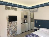 Kuchyňa alebo kuchynka v ubytovaní Elisir Suite Rooms by Marino Tourist