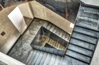 an overhead view of a spiral staircase in a building at IOTA Hotel Tbilisi in Tbilisi City