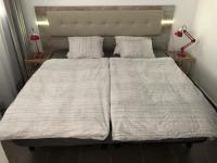 Posteľ alebo postele v izbe v ubytovaní Yumbo Apartments