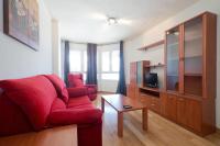 Televízia a/alebo spoločenská miestnosť v ubytovaní Apartamento Deluxe a Pie de Pista Miramar Ski