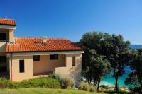 ein Haus auf einem Hügel mit Meerblick in der Unterkunft Maistra Select Petalon Resort in Vrsar