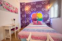 Posteľ alebo postele v izbe v ubytovaní Apartamentos Momas La Casa De Mamá