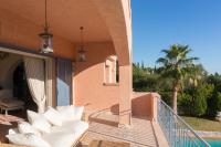 Bazén v ubytovaní Villa GreJo Porto Heli alebo v jeho blízkosti