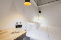 Postel nebo postele na pokoji v ubytování Your Space Hotel Prasingh