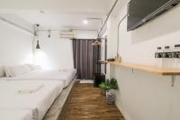 Postel nebo postele na pokoji v ubytování Your Space Hotel Prasingh