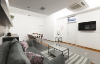 Televízia a/alebo spoločenská miestnosť v ubytovaní Apartments City Wellness Center