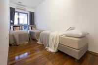 Posteľ alebo postele v izbe v ubytovaní Apartments City Wellness Center