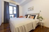 Posteľ alebo postele v izbe v ubytovaní Apartments City Wellness Center