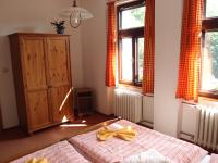 Postel nebo postele na pokoji v ubytování Penzion, apartmany Florian
