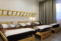 Postel nebo postele na pokoji v ubytování Apartmány za sakurou