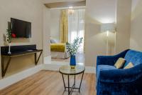 TV a/nebo společenská místnost v ubytování Halo Boutique Hotel