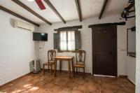 TV a/nebo společenská místnost v ubytování Hotel Rural El Cortijo