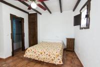 Postel nebo postele na pokoji v ubytování Hotel Rural El Cortijo