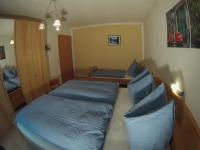 Łóżko lub łóżka w pokoju w obiekcie Appartement Millennium