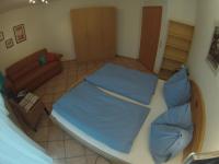 Łóżko lub łóżka w pokoju w obiekcie Appartement Millennium
