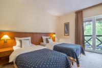 Posteľ alebo postele v izbe v ubytovaní Hotel Masuria