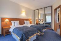 Posteľ alebo postele v izbe v ubytovaní Hotel Masuria