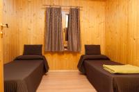 Cama o camas de una habitación en La Noguera Camping