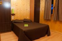 Cama o camas de una habitación en La Noguera Camping