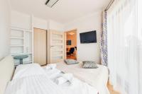 Posteľ alebo postele v izbe v ubytovaní Apartamenty Sun & Snow Horyzont