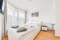 Posteľ alebo postele v izbe v ubytovaní Apartamenty Sun & Snow Horyzont