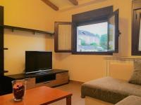 TV a/nebo společenská místnost v ubytování Apartamentos Rurales Flor De Lavanda