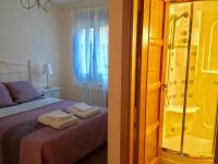 Postel nebo postele na pokoji v ubytování Apartamentos Rurales Flor De Lavanda