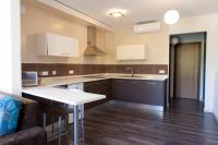 A kitchen or kitchenette at Apartamentos Sol de Mayo