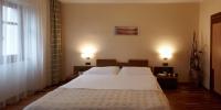 Postel nebo postele na pokoji v ubytování Hotel Penzion Na Hradě