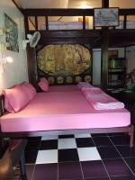 Postel nebo postele na pokoji v ubytování Ban Sabai Sabai Guest House