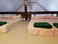 Postel nebo postele na pokoji v ubytování Ban Sabai Sabai Guest House