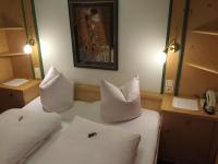 Łóżko lub łóżka w pokoju w obiekcie Hotel Gasthof Islitzer