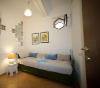 Łóżko lub łóżka w pokoju w obiekcie veronaeasyapartments