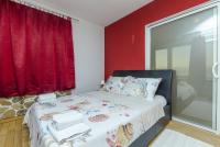 Posteľ alebo postele v izbe v ubytovaní Apartments Bluesun