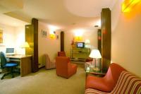 Televízia a/alebo spoločenská miestnosť v ubytovaní Hotel Eli-Mar