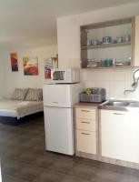 Kuchyňa alebo kuchynka v ubytovaní Nevena Apartments