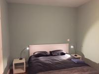 Postel nebo postele na pokoji v ubytování Ribeira Apartment