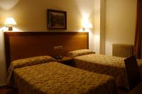 Postel nebo postele na pokoji v ubytování Hotel Torrezaf
