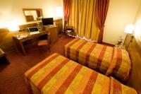 A bed or beds in a room at Hotel Master