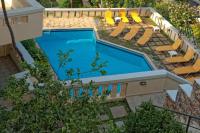 Bazén v ubytovaní Villiana Holiday Apartments alebo v jeho blízkosti