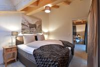 Postel nebo postele na pokoji v ubytování Narzenhof Wellness Chalets, Familien & Luxus Apartments am Bauernhof