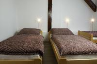 Postel nebo postele na pokoji v ubytování Apartmány za sakurou